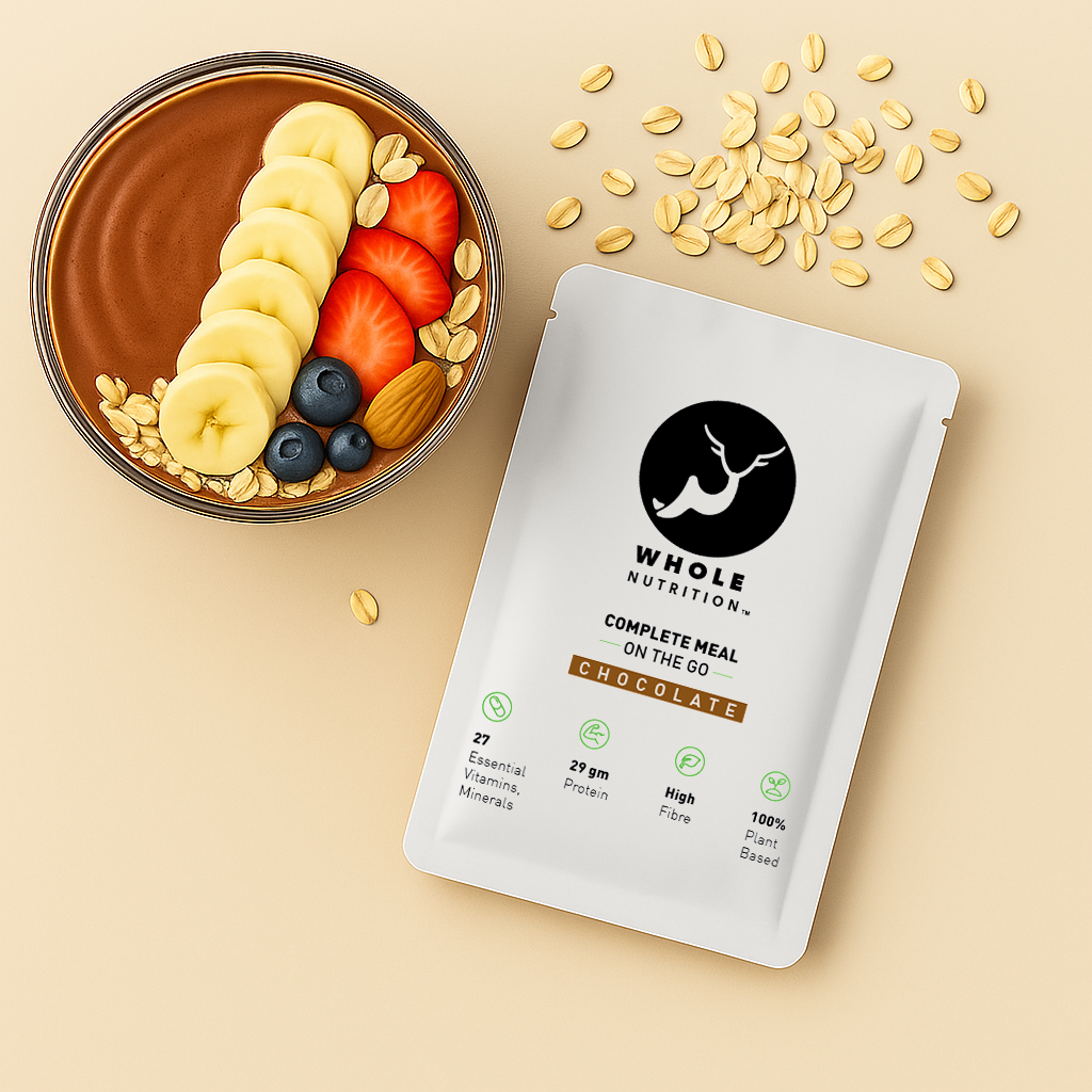 high protein oats meal whole nutrition chocolate  package with a bowl of chocolate smoothie, fruit, and oats.